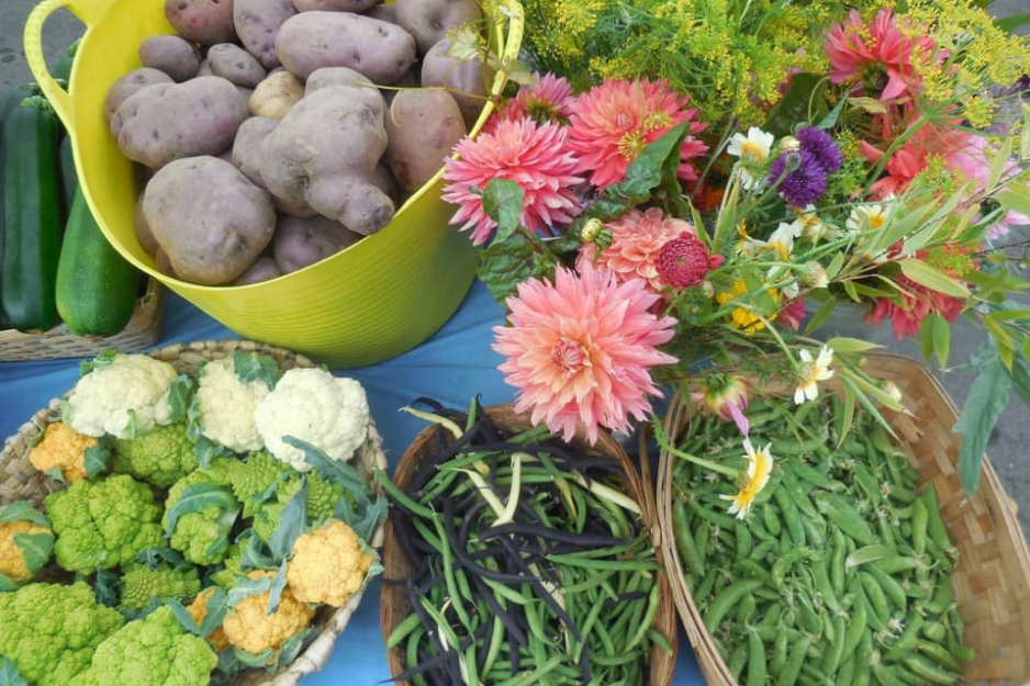 Produce from the farm includes potatoes, flowers, cauliflower, broccoli, green beans and peas