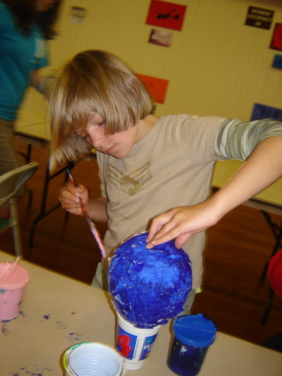 Camper working on an art project